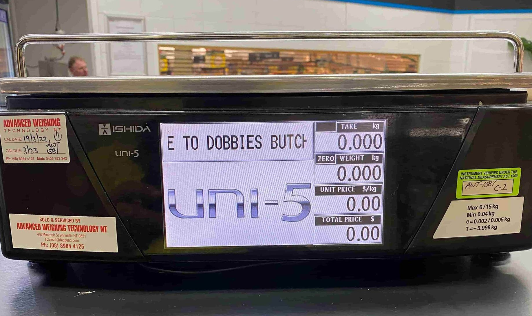 A Scale Is Sitting On A Counter In A Store — Advanced Weighing Technology NT Pty Ltd In Broome, WA