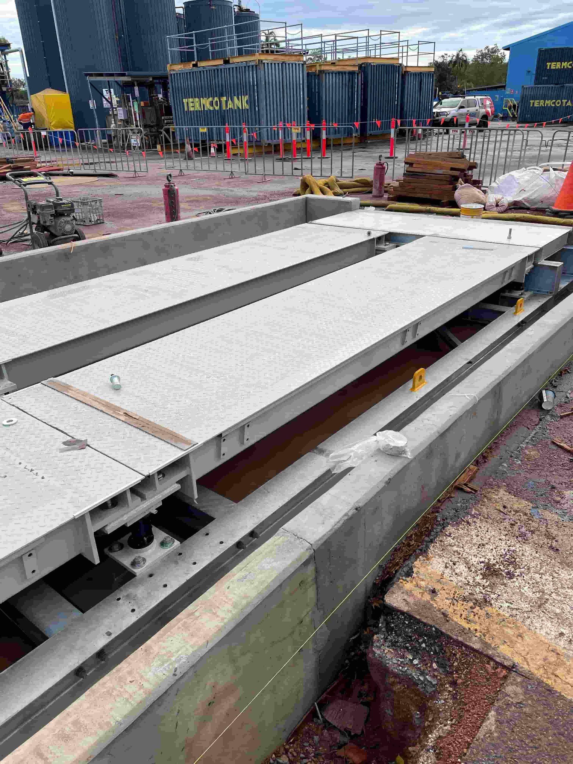 A Large Metal Structure Is Sitting On Top Of A Concrete Surface — Advanced Weighing Technology NT Pty Ltd In Broome, WA