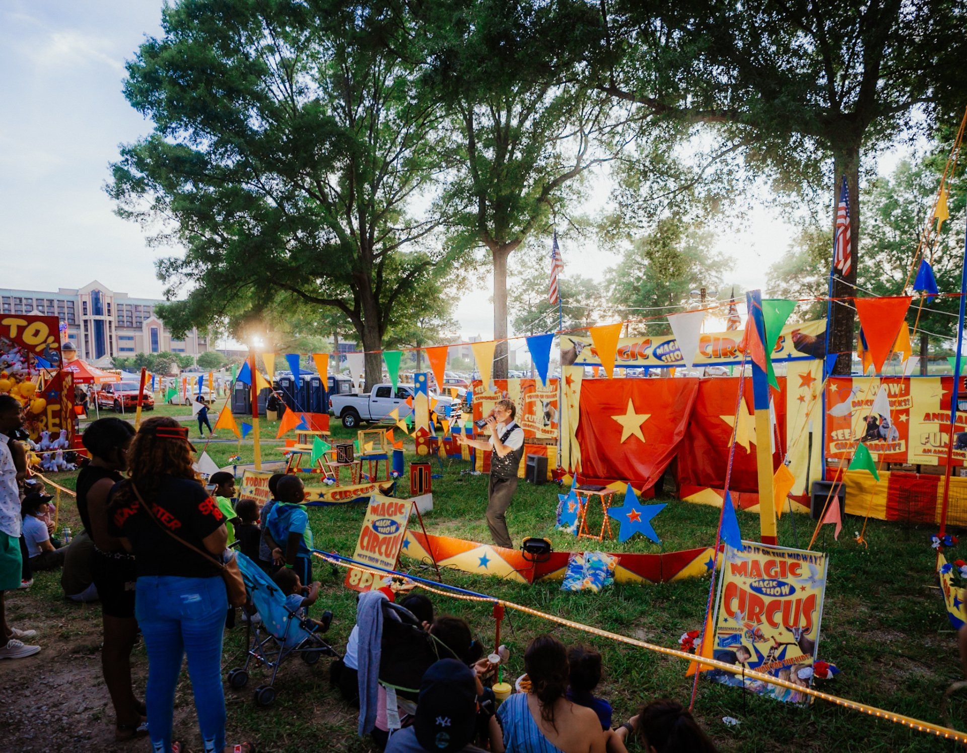 A carnival with a sign that says magic circus