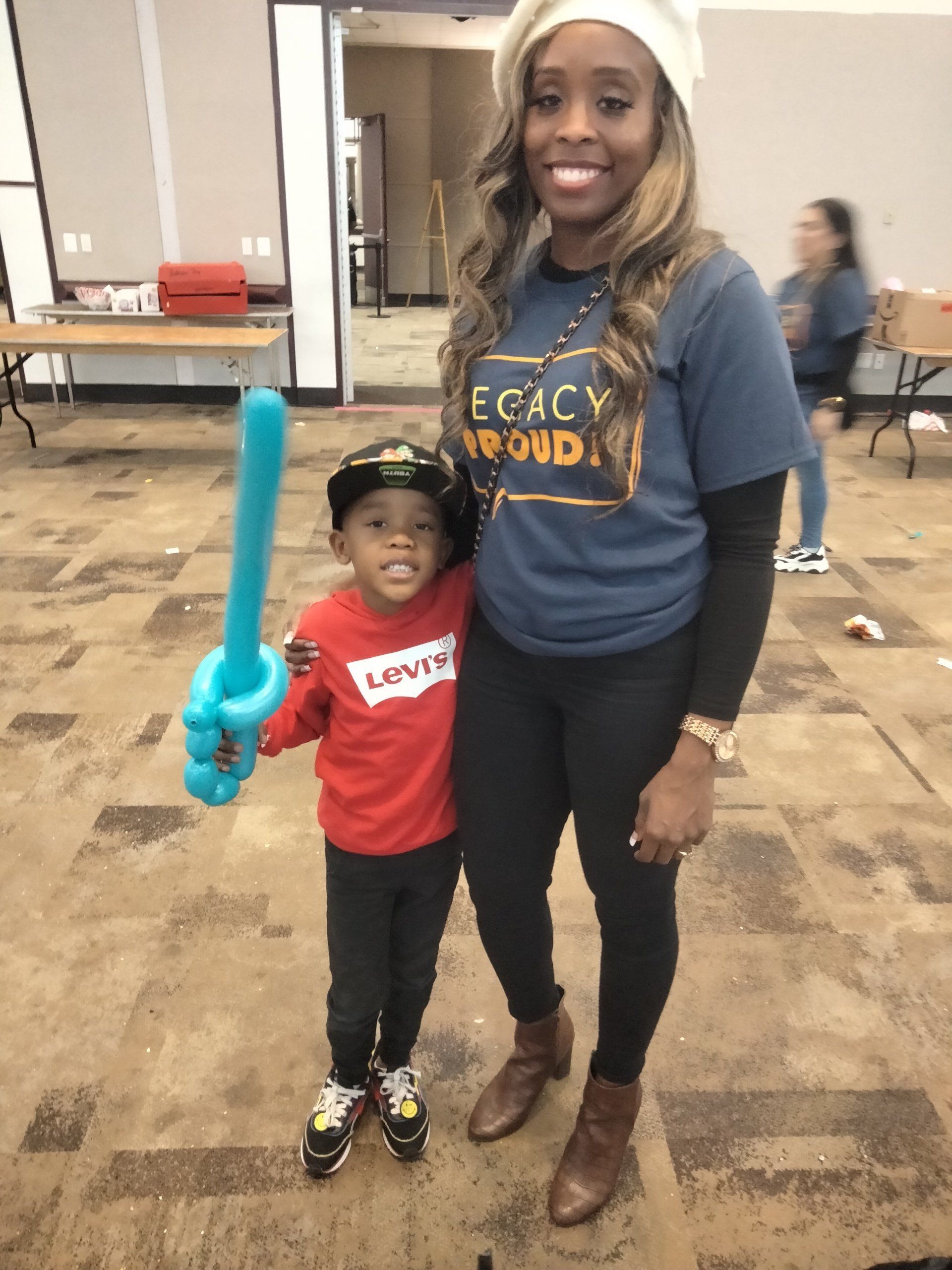 Happy Kid Holding Balloon Sword