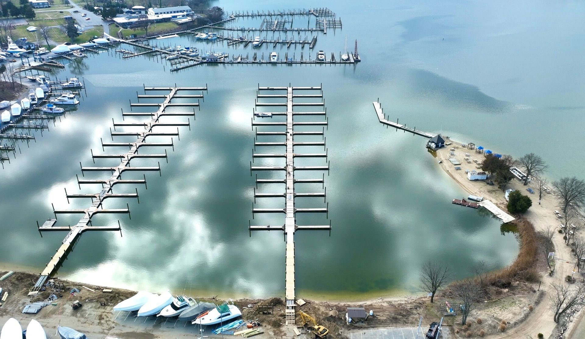 An aerial view of a marina with boats docked
