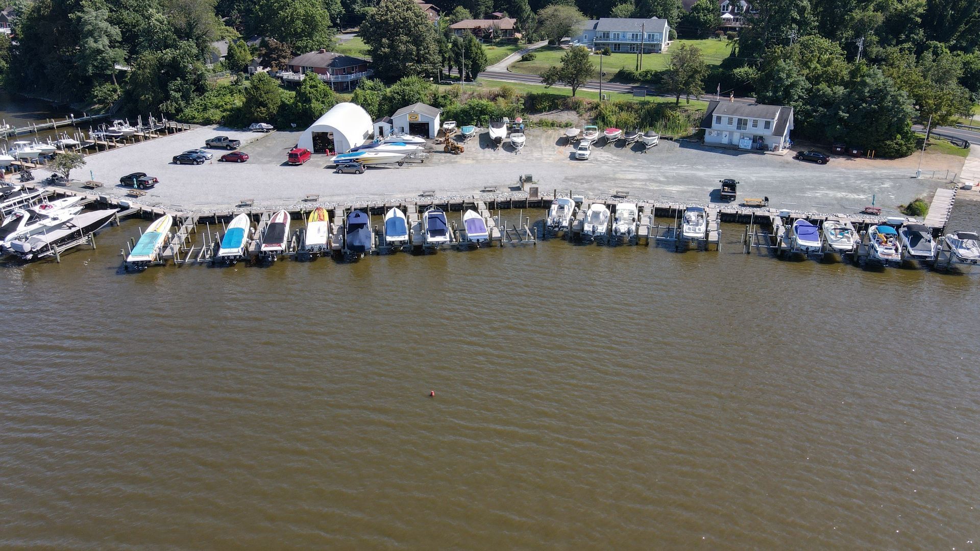 An aerial view of a marina with boats docked