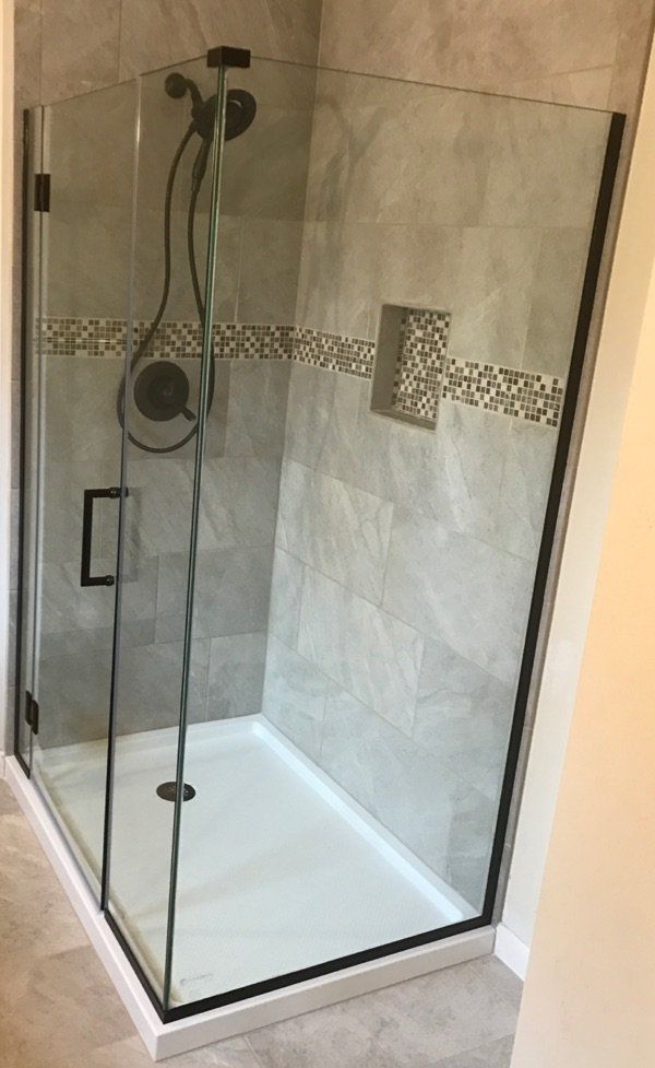 Glass shower door with glass side wall makes your shower truly stand out!