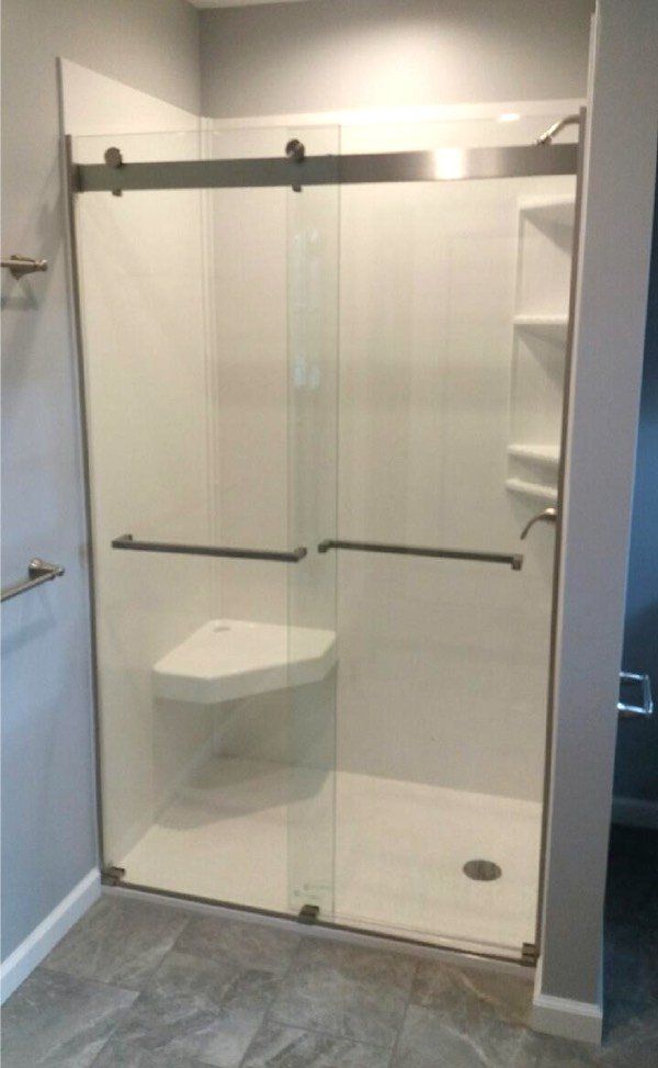 Glass shower doors add a touch of class to any bathroom shower installation!