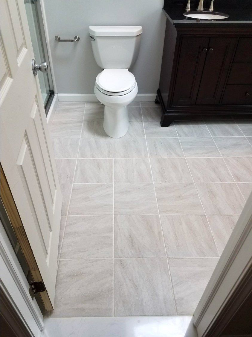 White and gray tile with bright wide grout for an extra clean look
