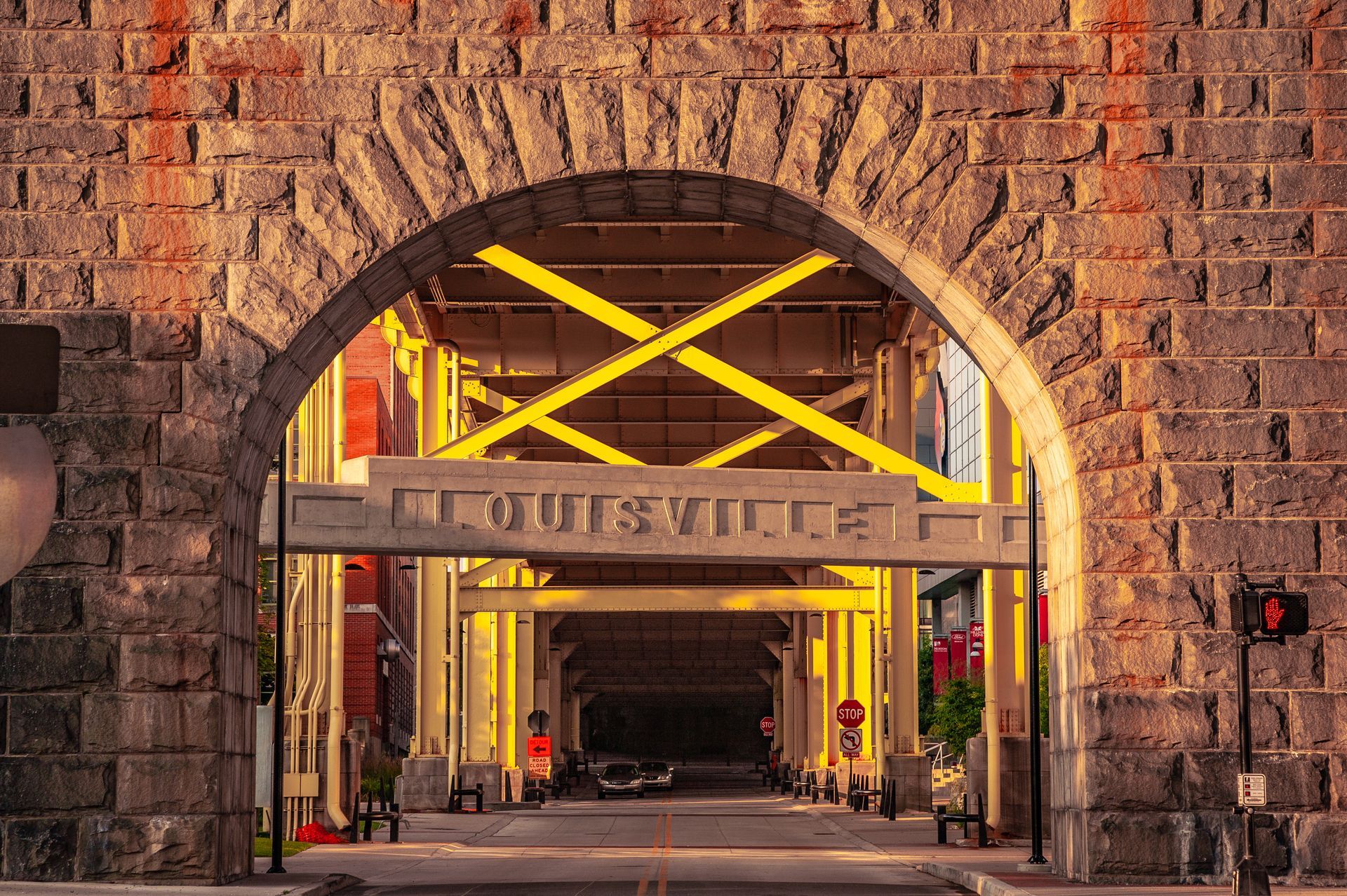 A man is swinging a golf club on a golf course.