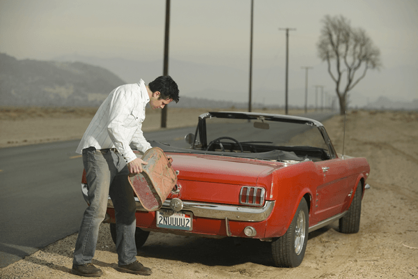 Refuel — Man Refueling The Cat in Medford, OR