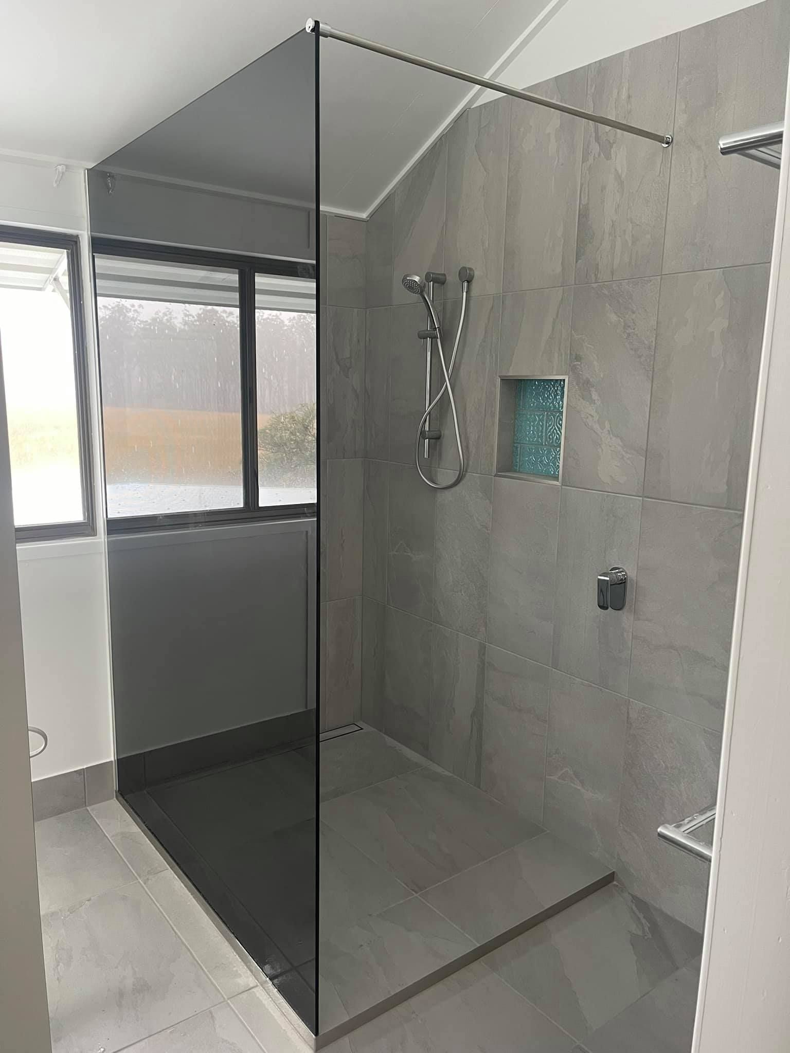 Modern Shower With Gray Tile Walls — Moore Park Beach Glass & Security in Moore Park Beach, QLD