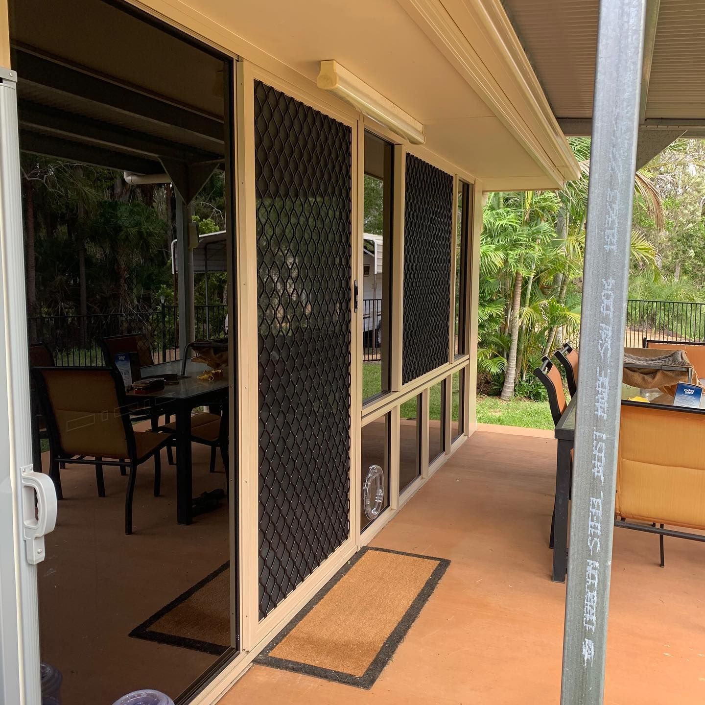 Well-maintained security screens at a residential home.