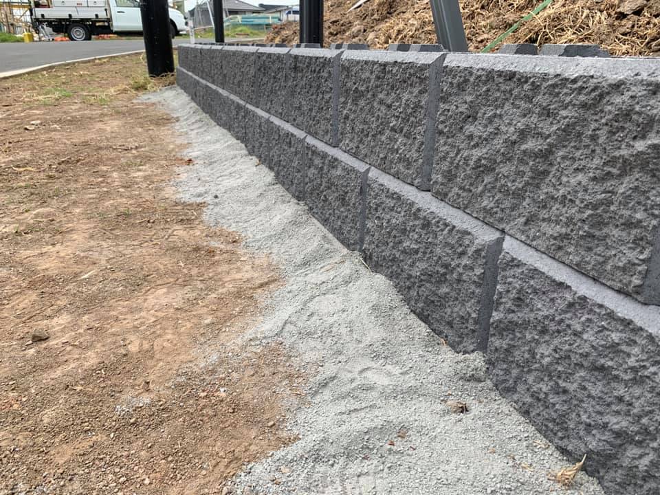 Stone Retaining Wall - Landscaping Services in Freemans Reach, NSW