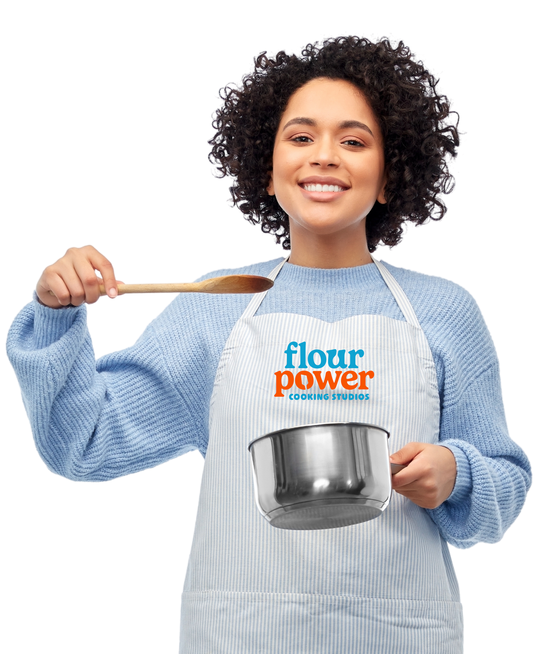 a woman in an apron is holding a pot and a wooden spoon .
