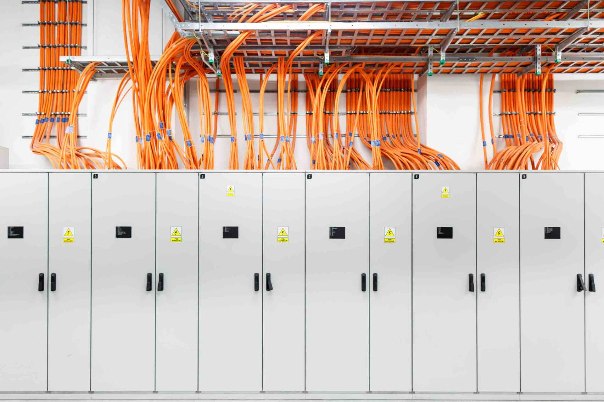 Organized orange electrical cables — Electrical & Fire Services in Darwin, NT