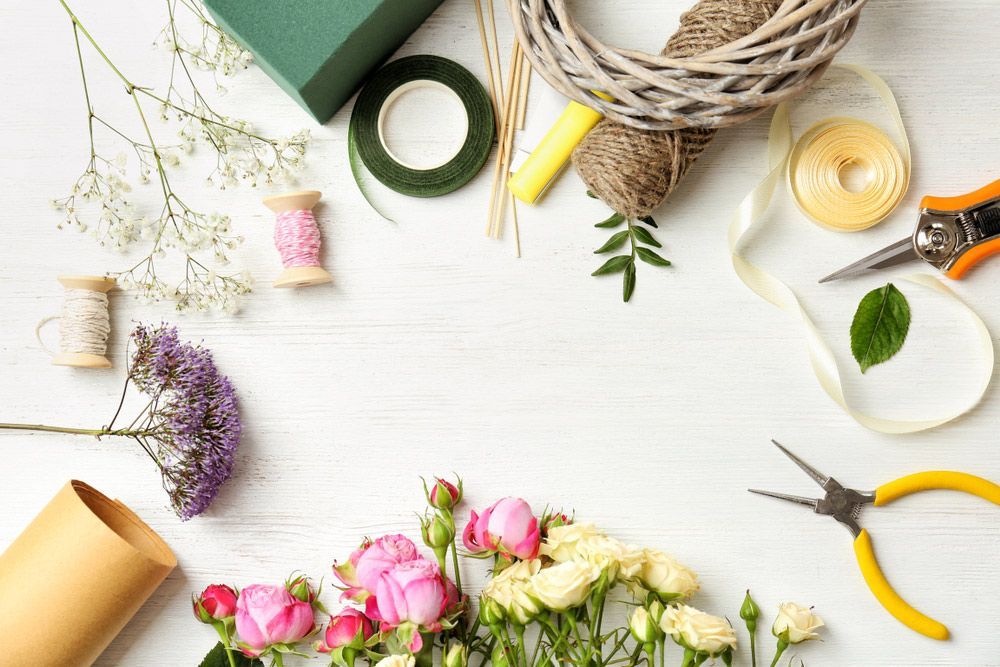 There Are Many Different Types of Flowers and Tools on The Table — Pick-A-Bunch Florists & Gifts In Hay Point, QLD
