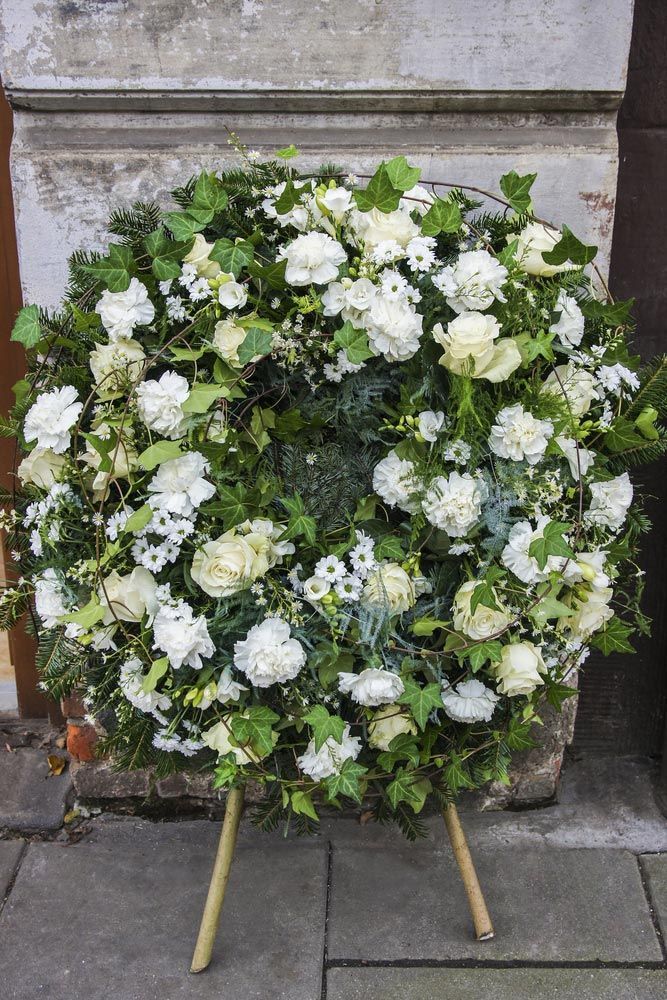 A Heart Shaped Wreath Made of White Roses and Baby's Breath — Pick-A-Bunch Florists & Gifts In Armstrong Beach, QLD