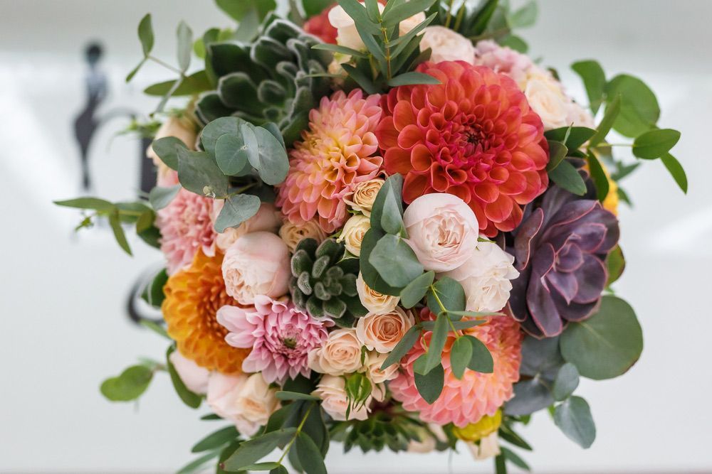 A Close Up Of a Bouquet of Flowers on A Table — Pick-A-Bunch Florists & Gifts In Koumala, QLD
