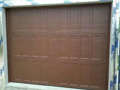 installing a brand new garage door