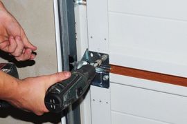 Contractor repair and replace garage door. Garage door installation
