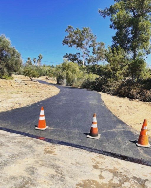 grading new driveway and paving it6