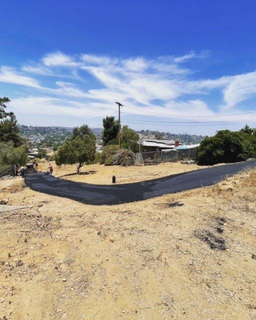 grading new driveway and paving it5