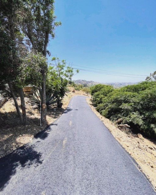 grading new driveway and paving it4