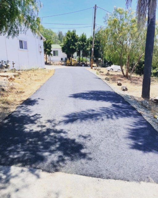 grading new driveway and paving it3