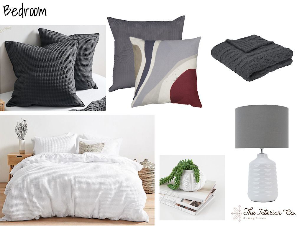 A bedroom with a bed , pillows , blankets and a lamp