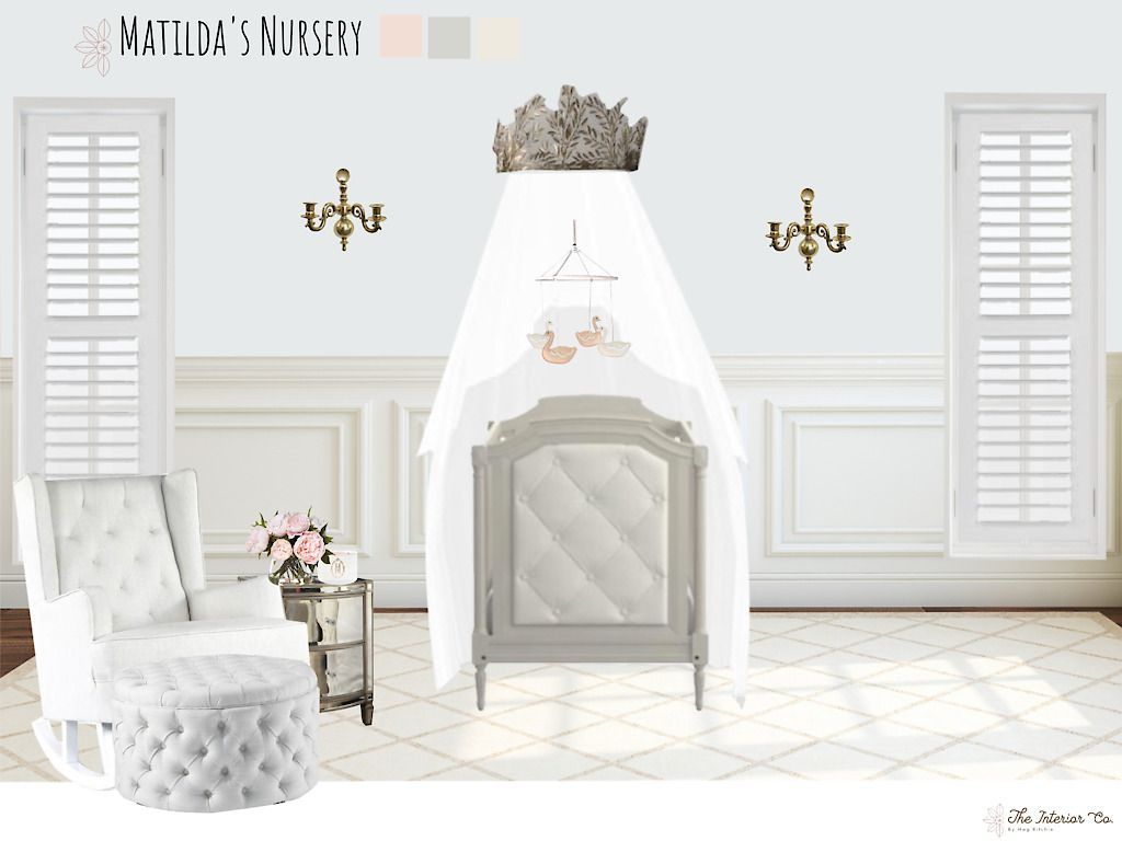 A nursery with a crib , chair , ottoman and shutters