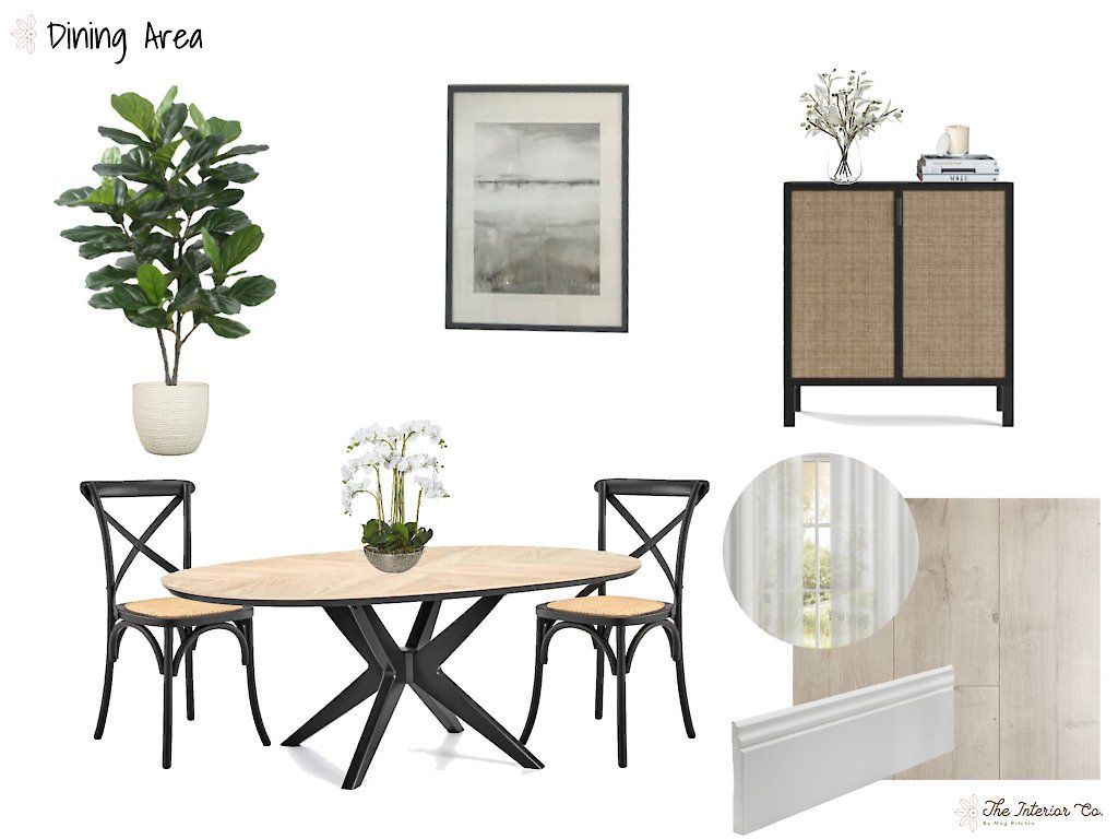 A dining room with a table and chairs and a wicker cabinet.