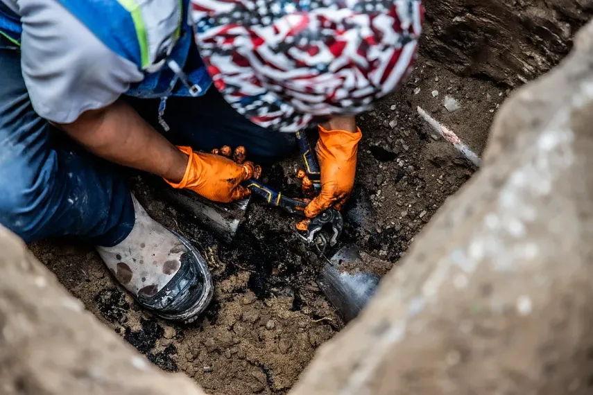 Underground Trenchless Crew working  to repair pipes