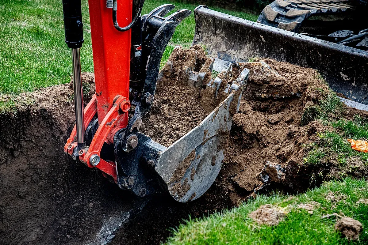 Excavating to install septic tank