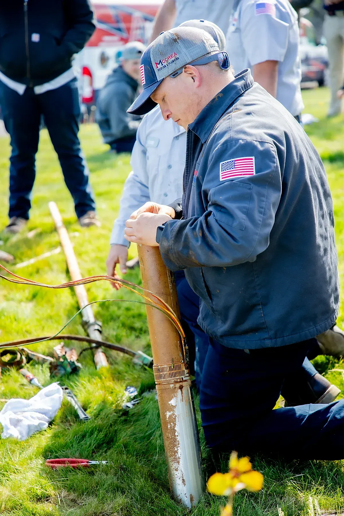 Tech working on a well pump install