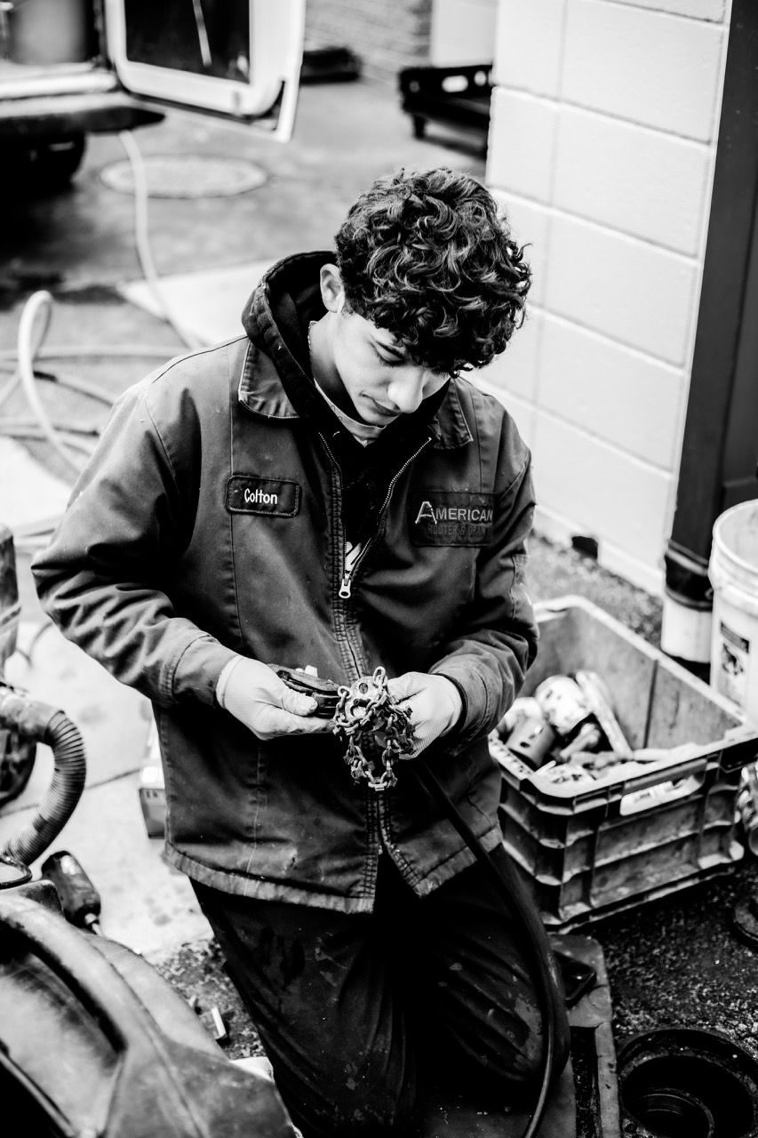 Trenchless Plumbing Technician working on job site