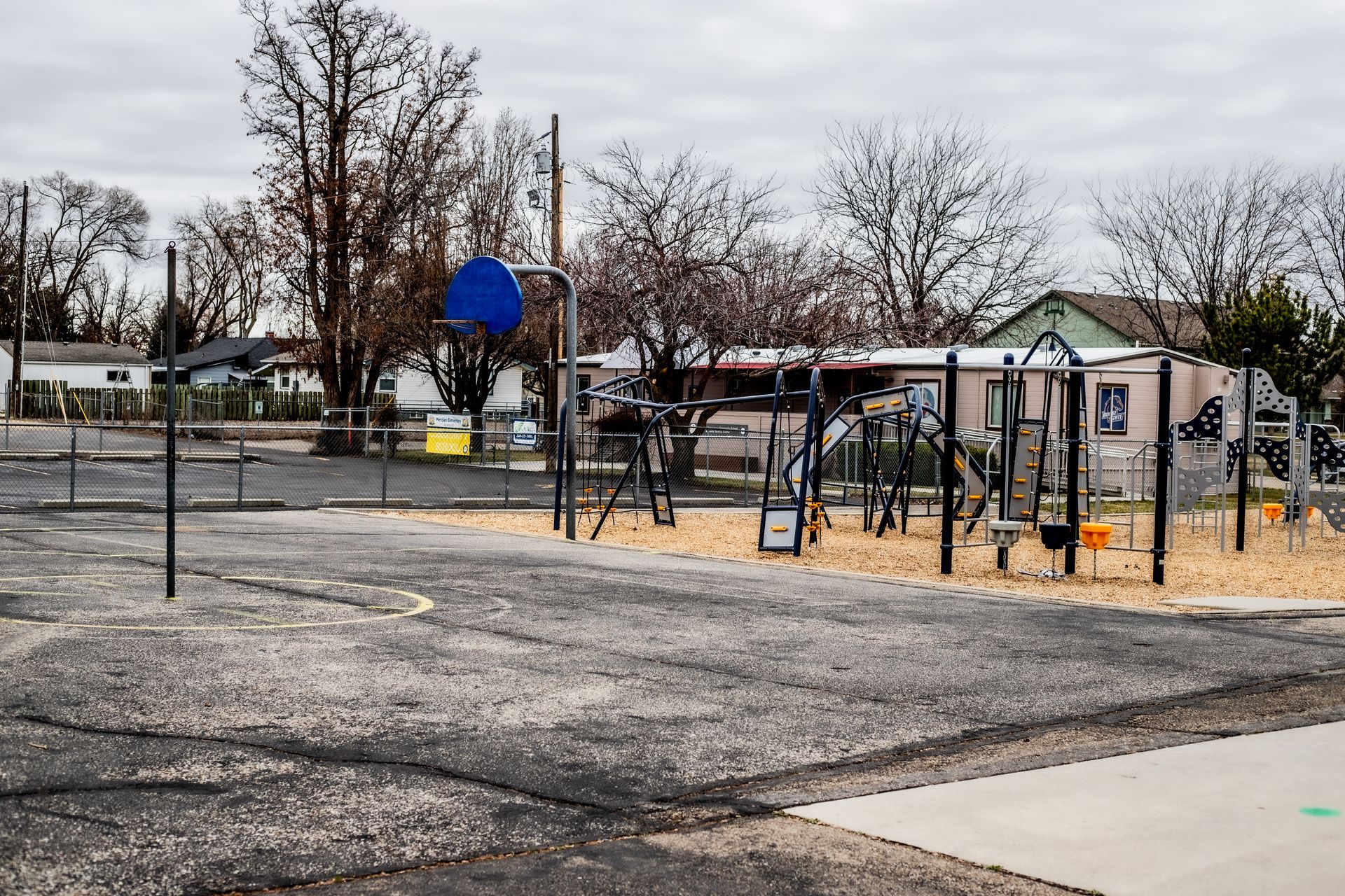 Drain technicians and underground plumbing crew working an elementary school to replace busted pipes