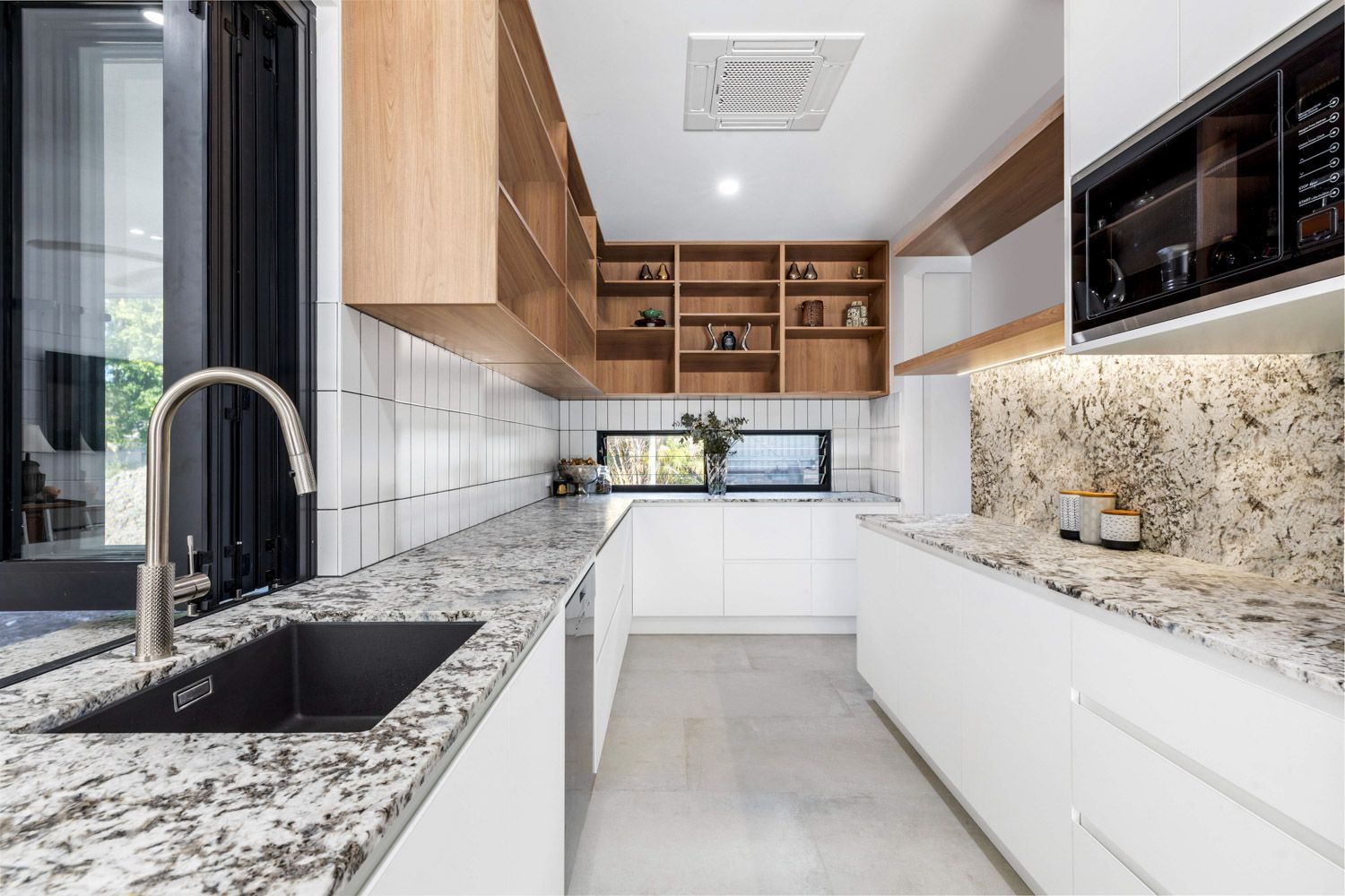Modern Kitchen With Brown Cabinets - Granite Benchtops on the Sunshine Coast, QLD