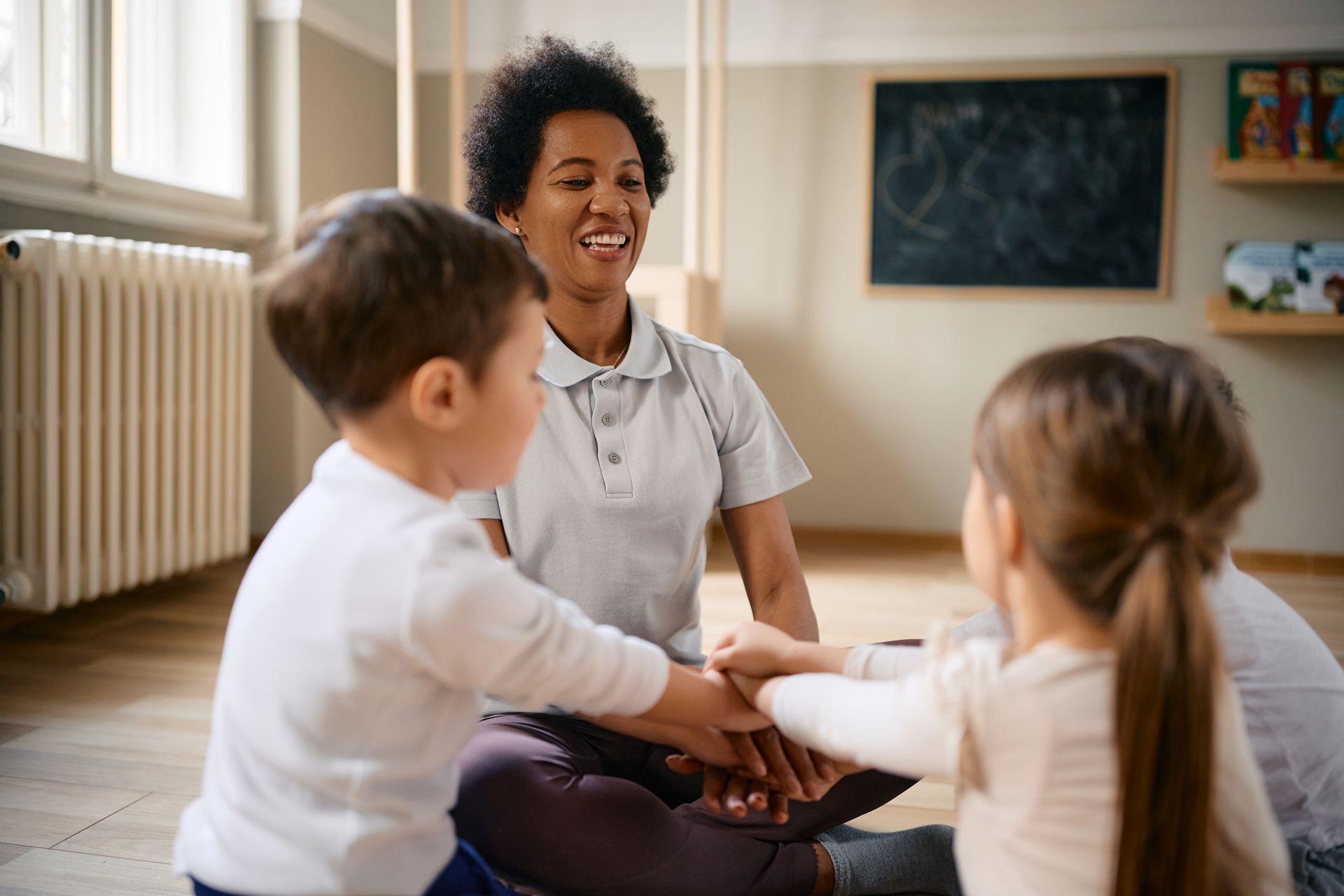 happy teacher with children