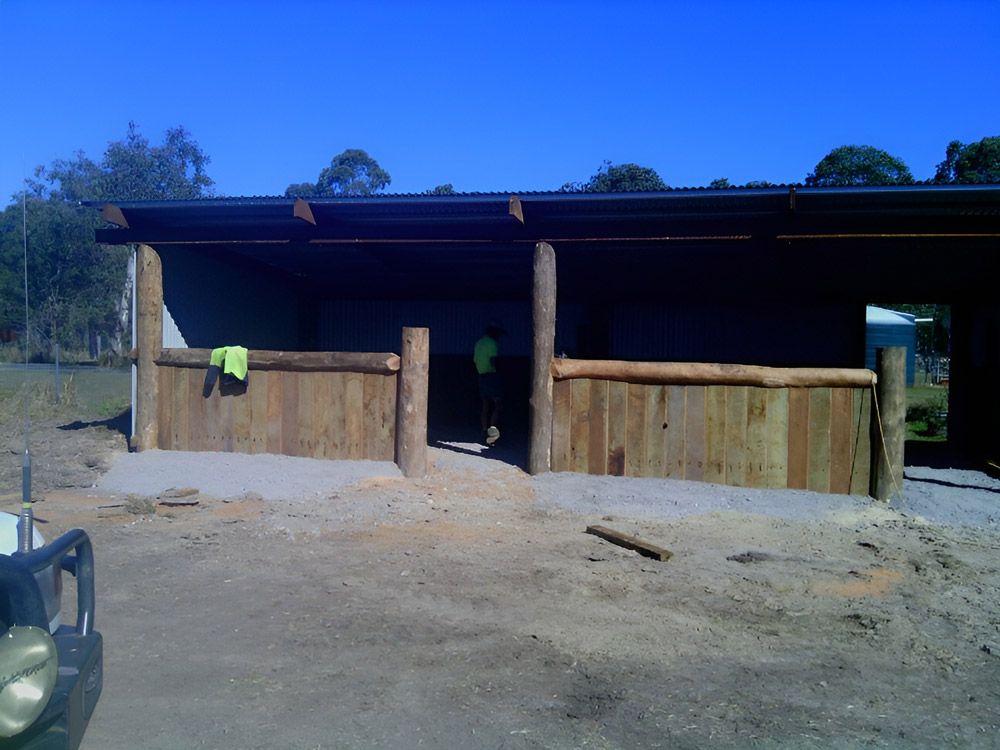 Wooden Horse Stables — Lawrence Williams Fencing in Goolmangar, NSW