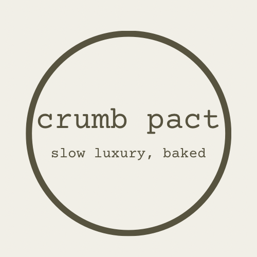 Cupcake with cream frosting, cherry on top, sitting on red watercolor; text