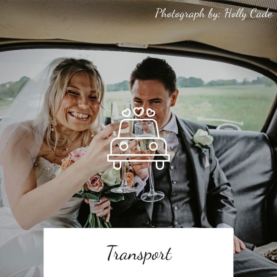 Newlyweds toasting champagne in a vintage car, bride smiling, groom looking toward camera.