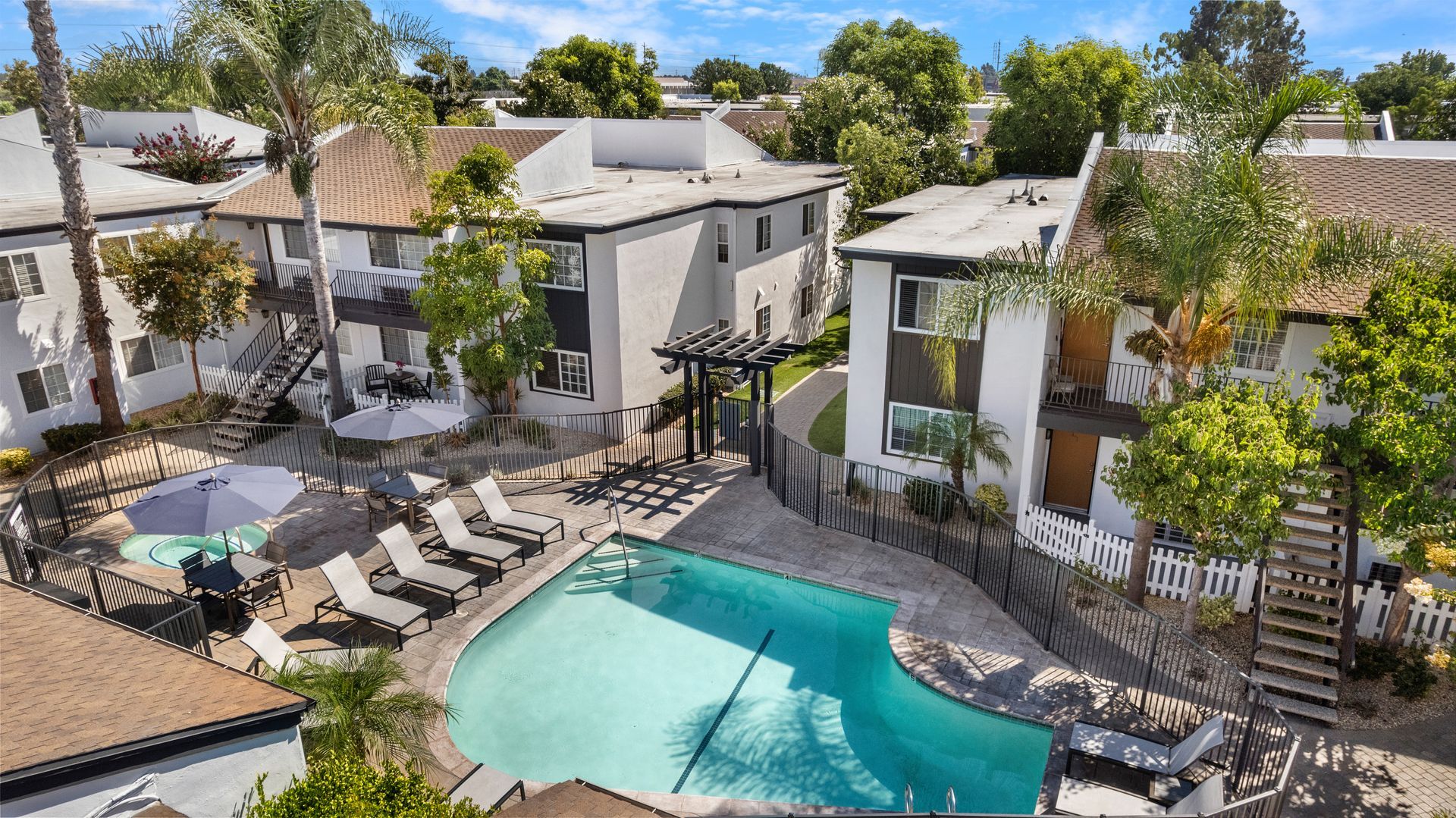 overhead view of pool and apartments