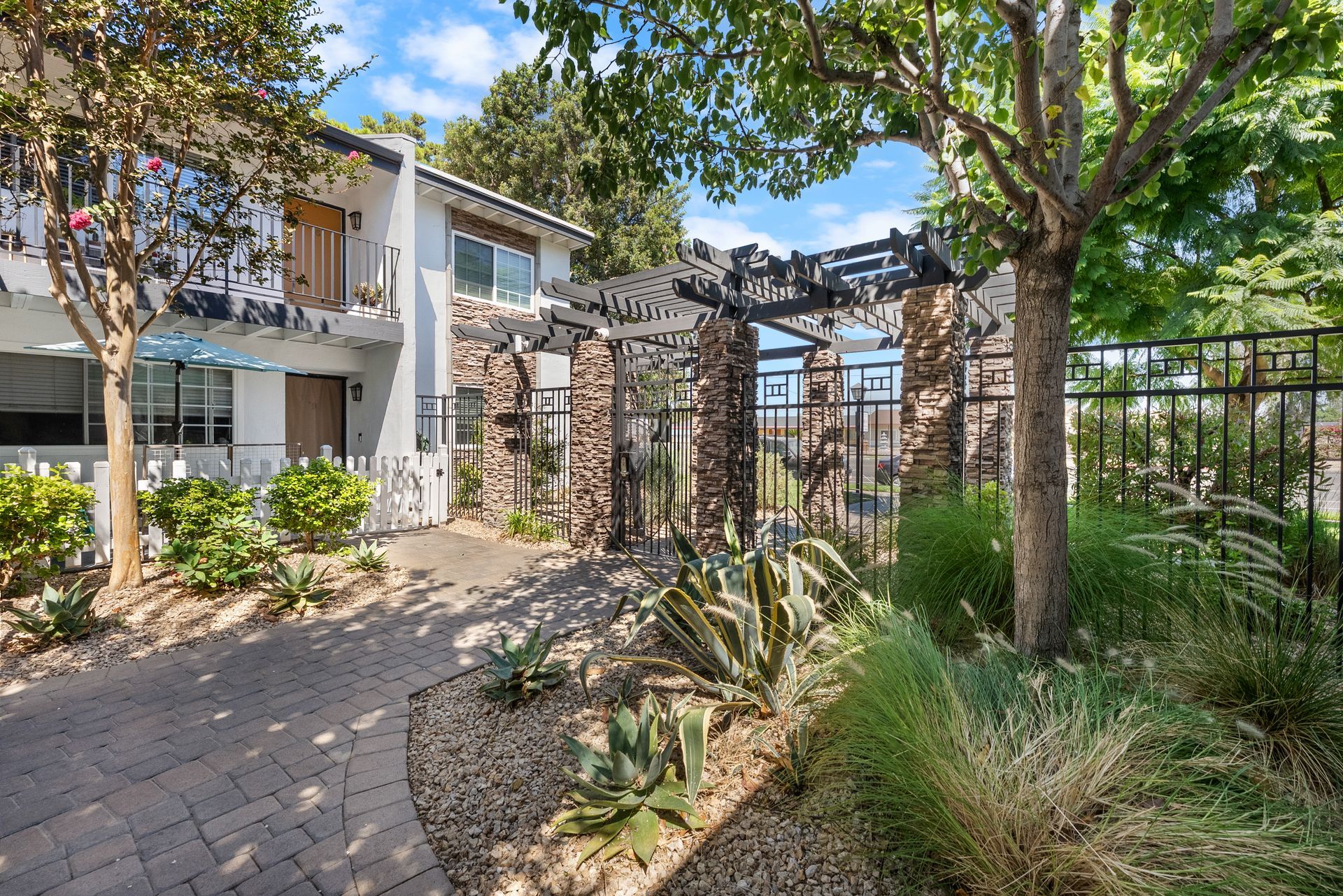 tree shaded entry gate