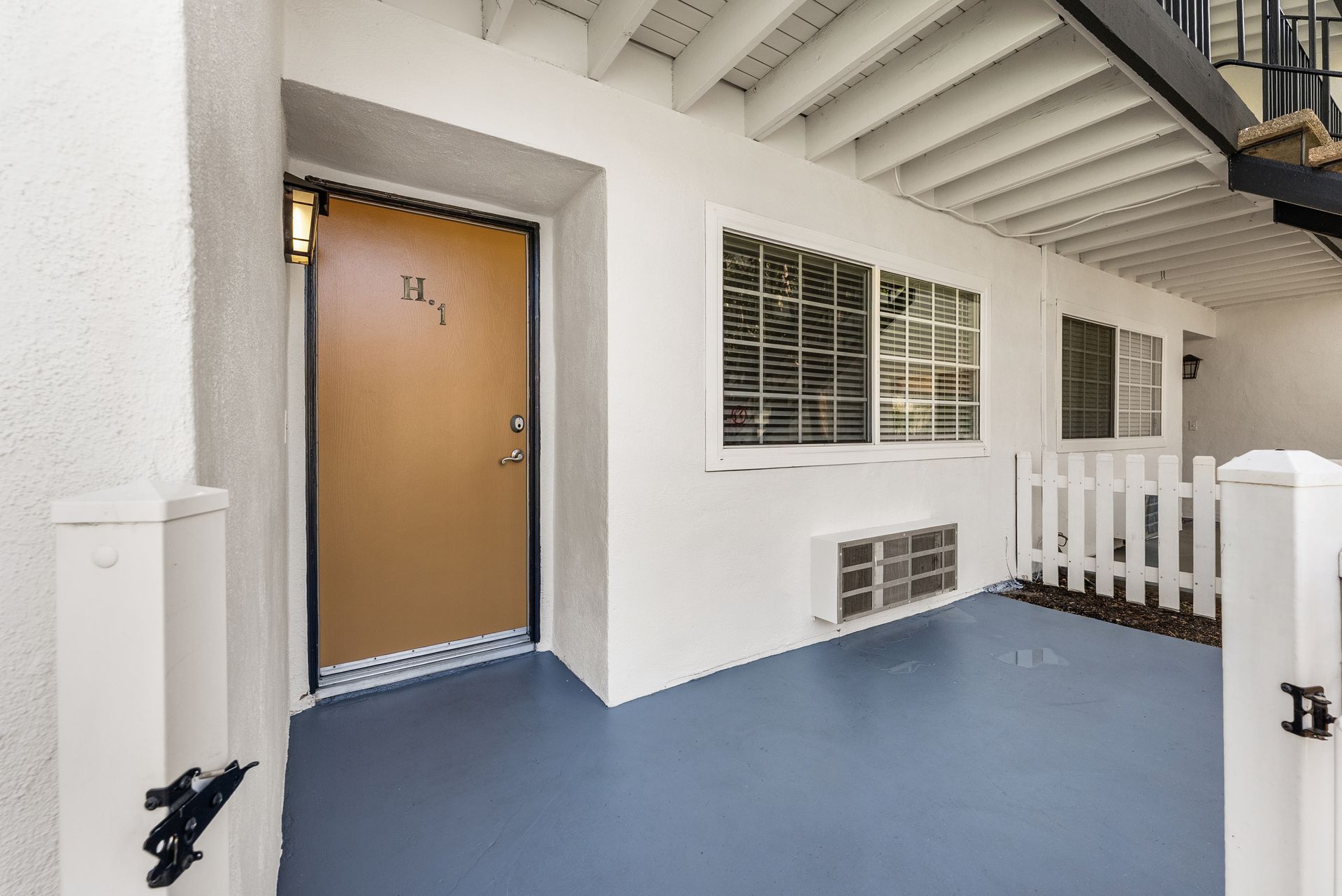 patio and front door to apartment