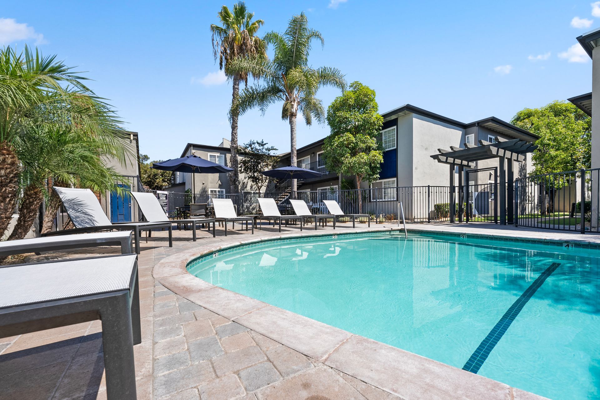 pool with lounge chairs