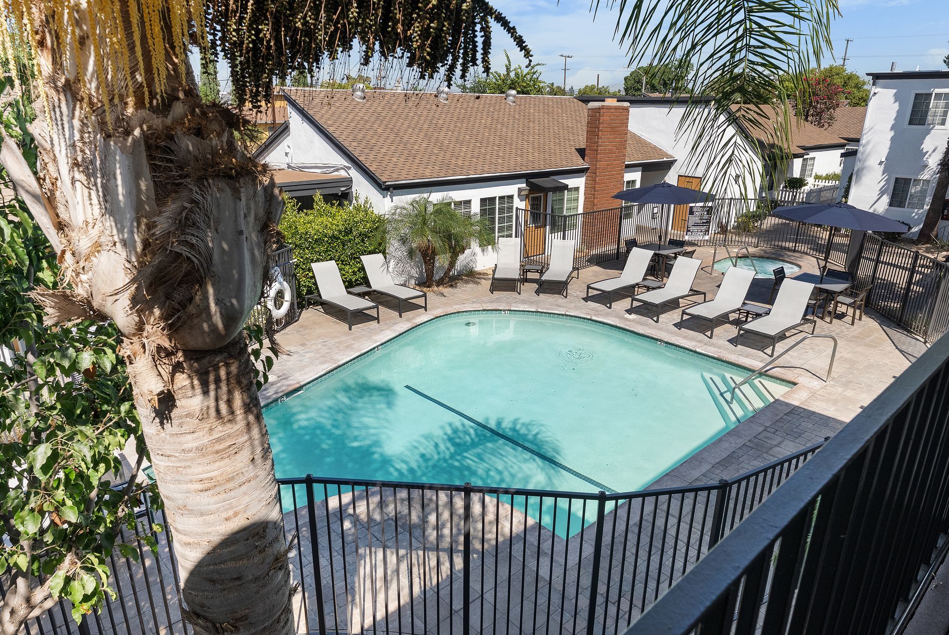 overhead view of pool with lounge chairs