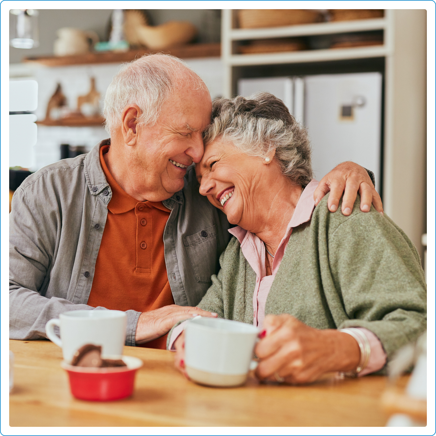 Older couple embracing each other.