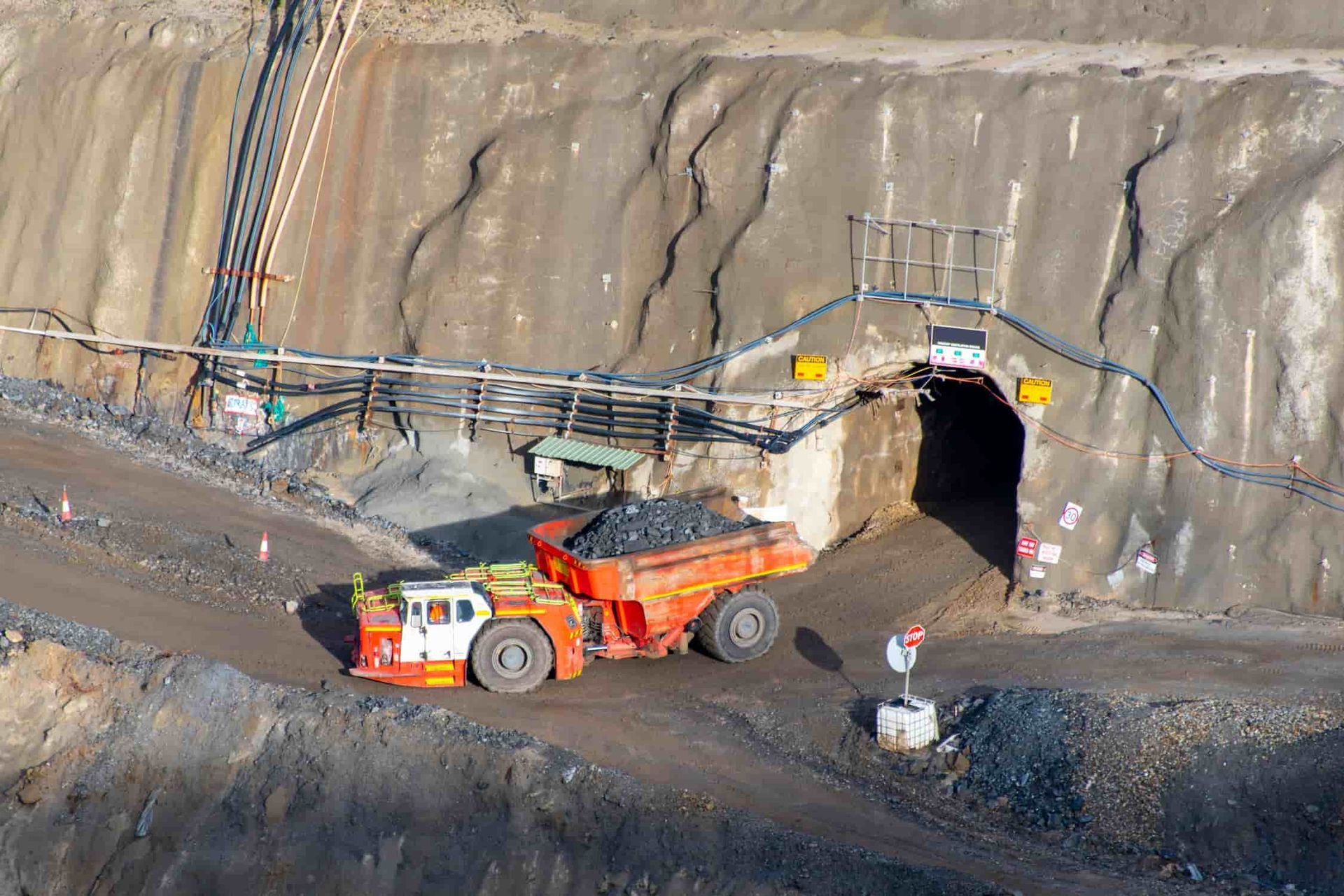 An Aerial View of a Truck Loading Coal Into a Tunnel — Northern Franna Cranes NT in Mcarthur River, NT