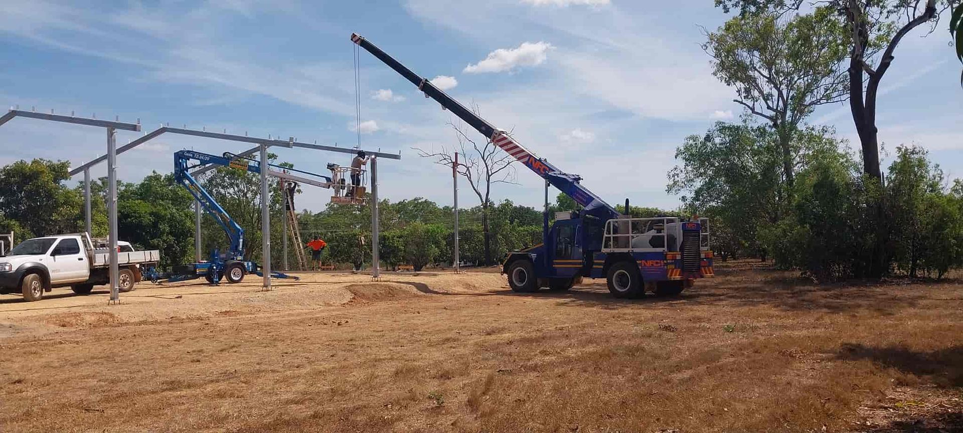 A Crane Is Being Used to Build a Building in A Field — Northern Franna Cranes NT in Noonamah, NT