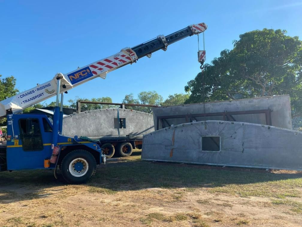 A Crane Is Lifting a Large Piece of Concrete in A Field — Northern Franna Cranes NT in Noonamah, NT