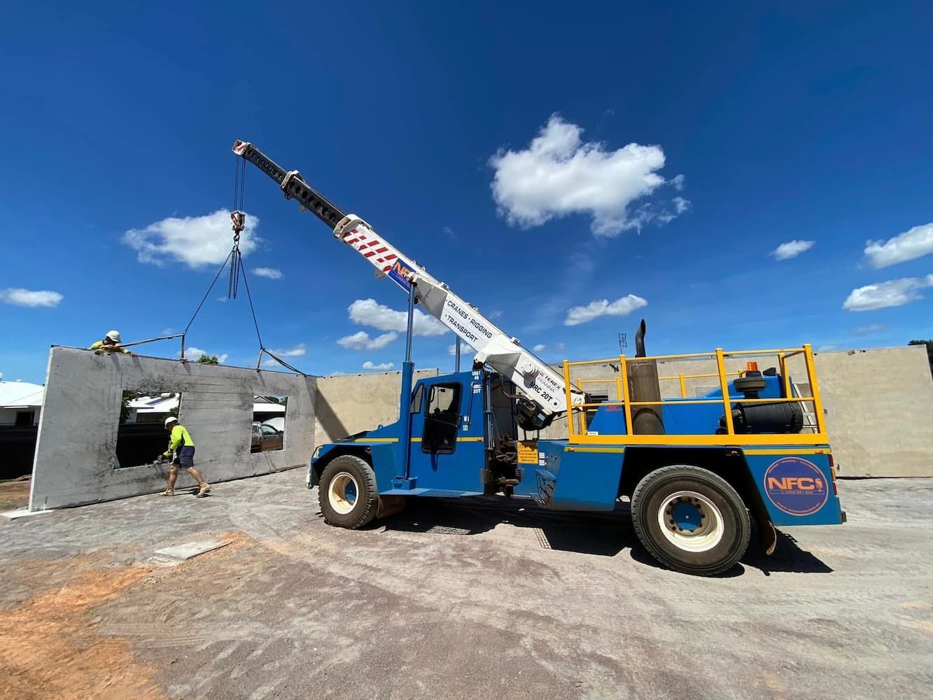 A Crane is Lifting a Concrete Wall on a Construction Site — Northern Franna Cranes NT in Noonamah, NT