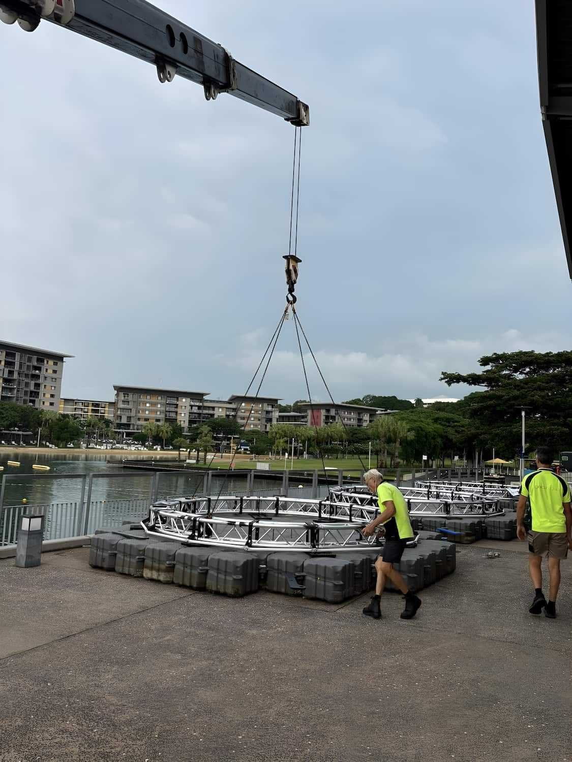 A Crane is Lifting a Boat Into the Water — Northern Franna Cranes NT in Palmerston, NT