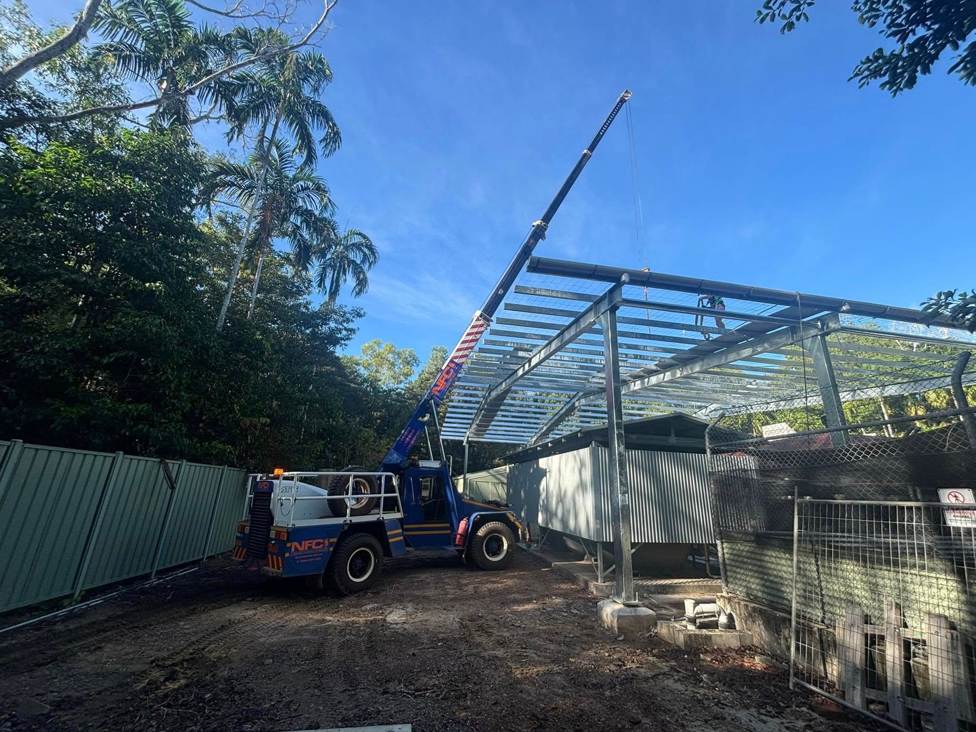 A Blue Crane Is Lifting Materials — Northern Franna Cranes NT in Noonamah, NT